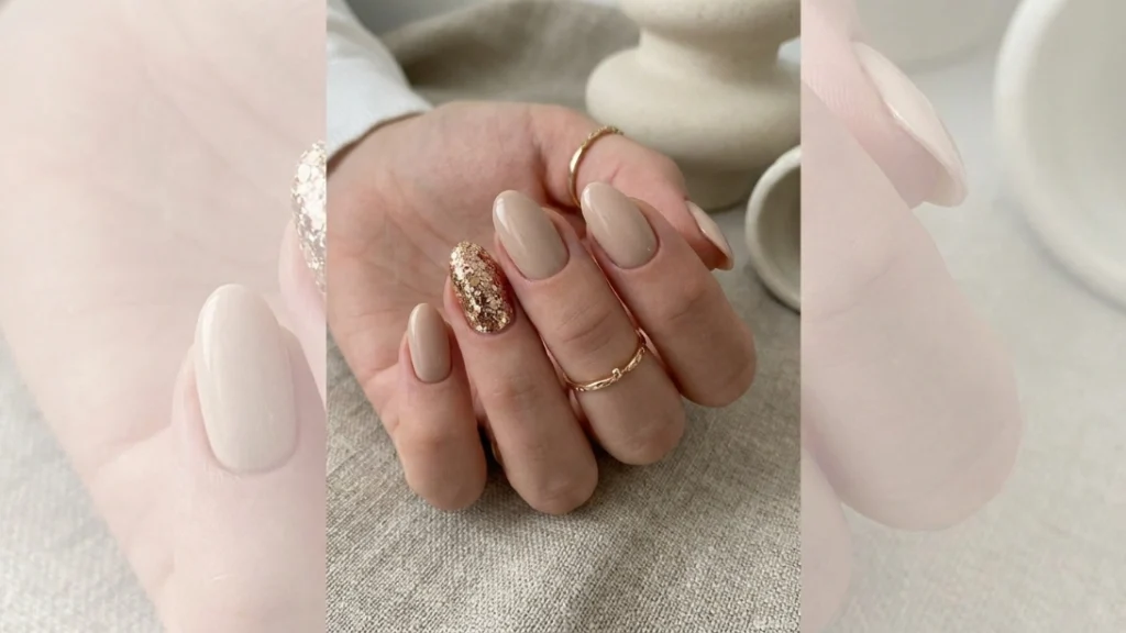 short almond nails - neutral manicure with bold accent nail