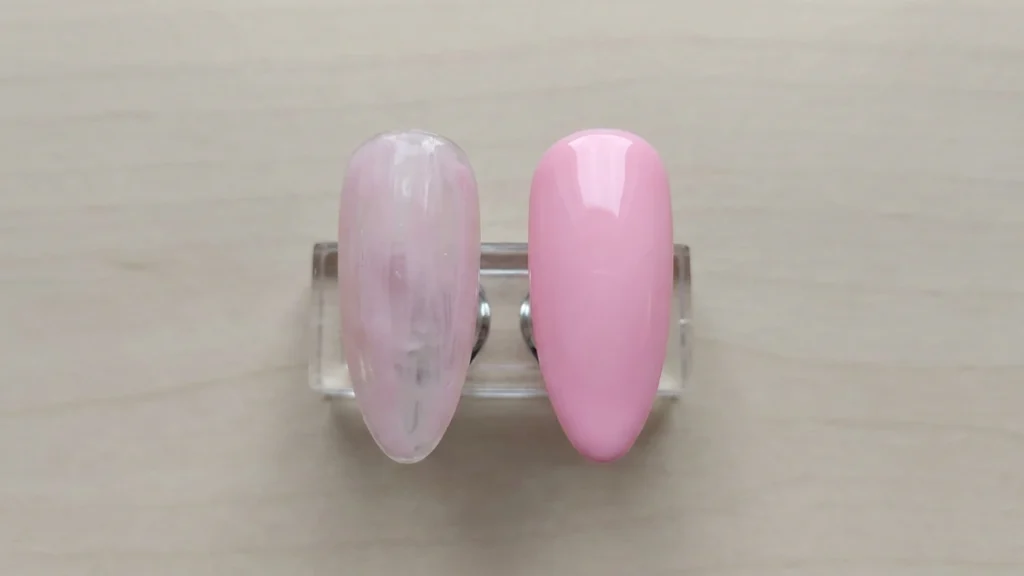 baby pink french tips - press-on nails next to acrylic set