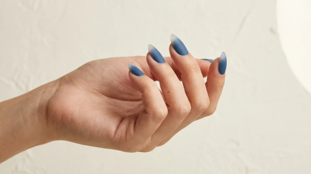 Denim blue nails with a milky white French tip variation
