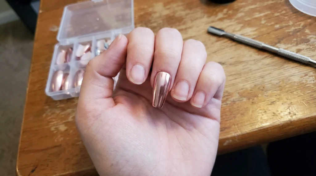 medium coffin shape rose gold chrome press-on nails side view