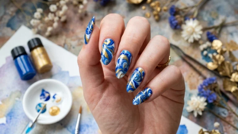 marble nail art at home - finished blue and gold water marble design feature image