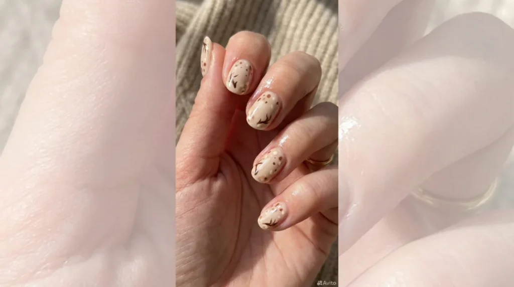 The finished look: glossy deer print nails ready to wear.